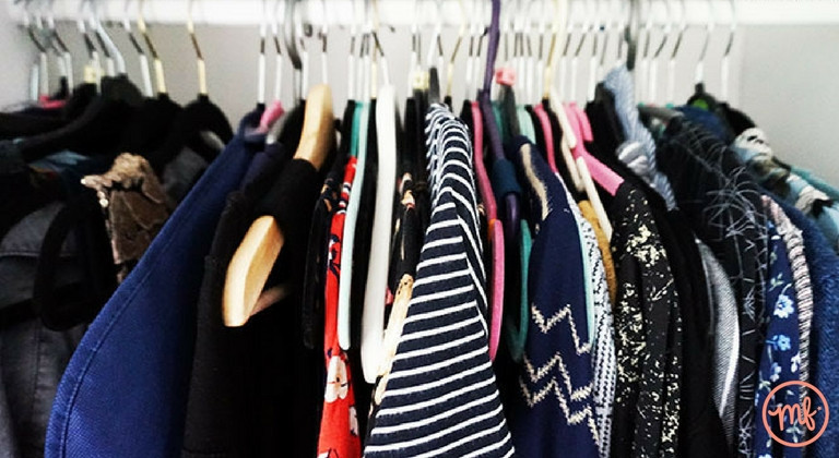 Clothes rail filled with different items of clothing