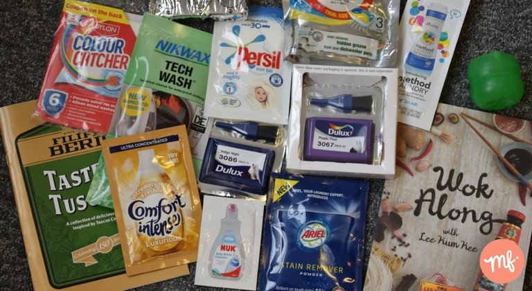 Selection of free stuff for the home, including free Ariel and Persil washing powder, free recipe books and free Dulux paint