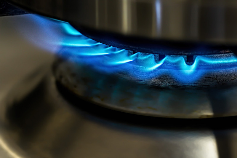 Close up of blue flame from a kitchen hob