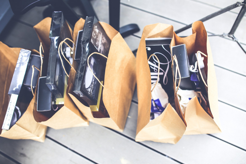 Birds eye image of five brown paper shopping bags