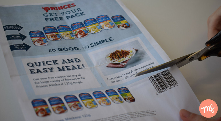 Pair of scissors cutting a Princes tuna coupon
