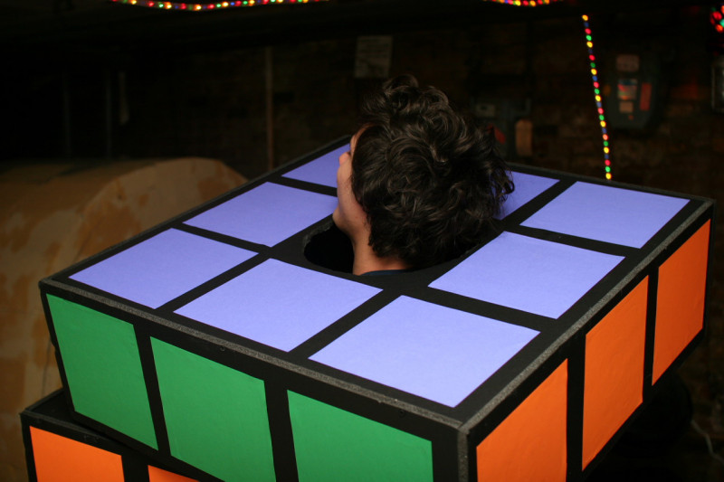 Close up of the back of a man in a Rubik's Cube Halloween costume
