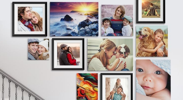 Collection of canvas photo prints on a staircase